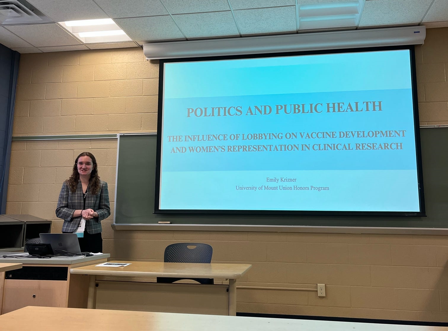 student presenting in classroom