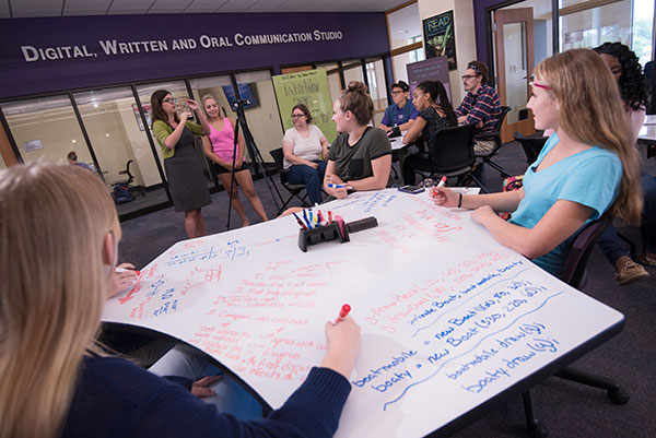 students sitting at table at dwoc