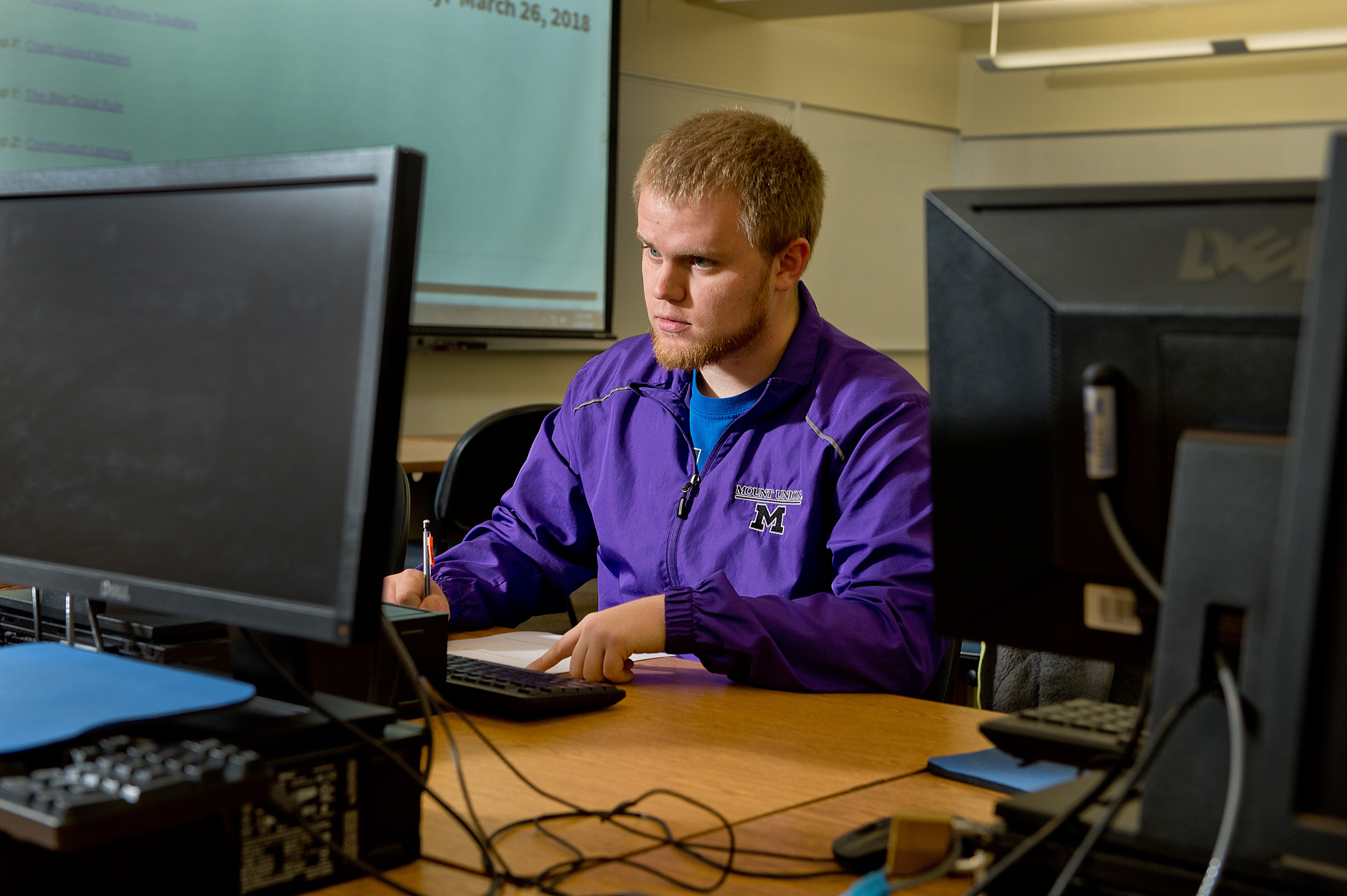 student looking at computer